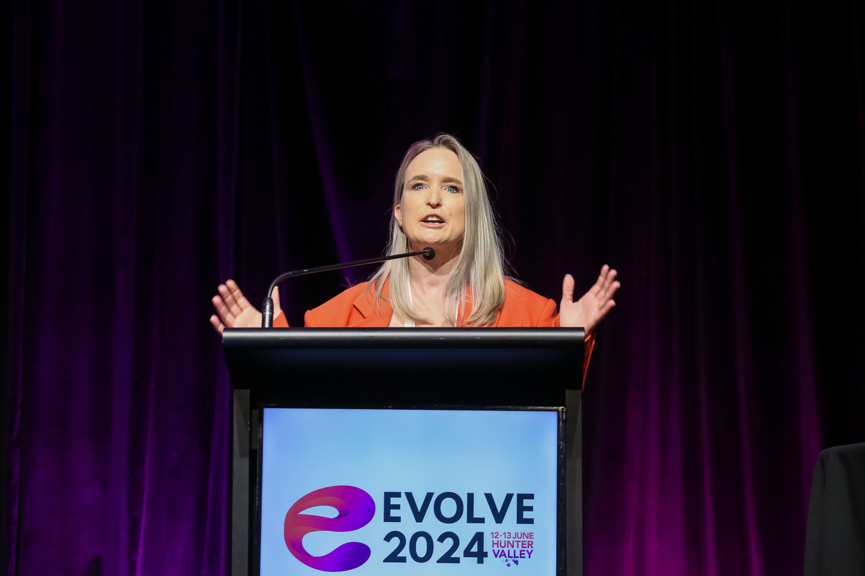 Libbie keynoting at Evolve 2024