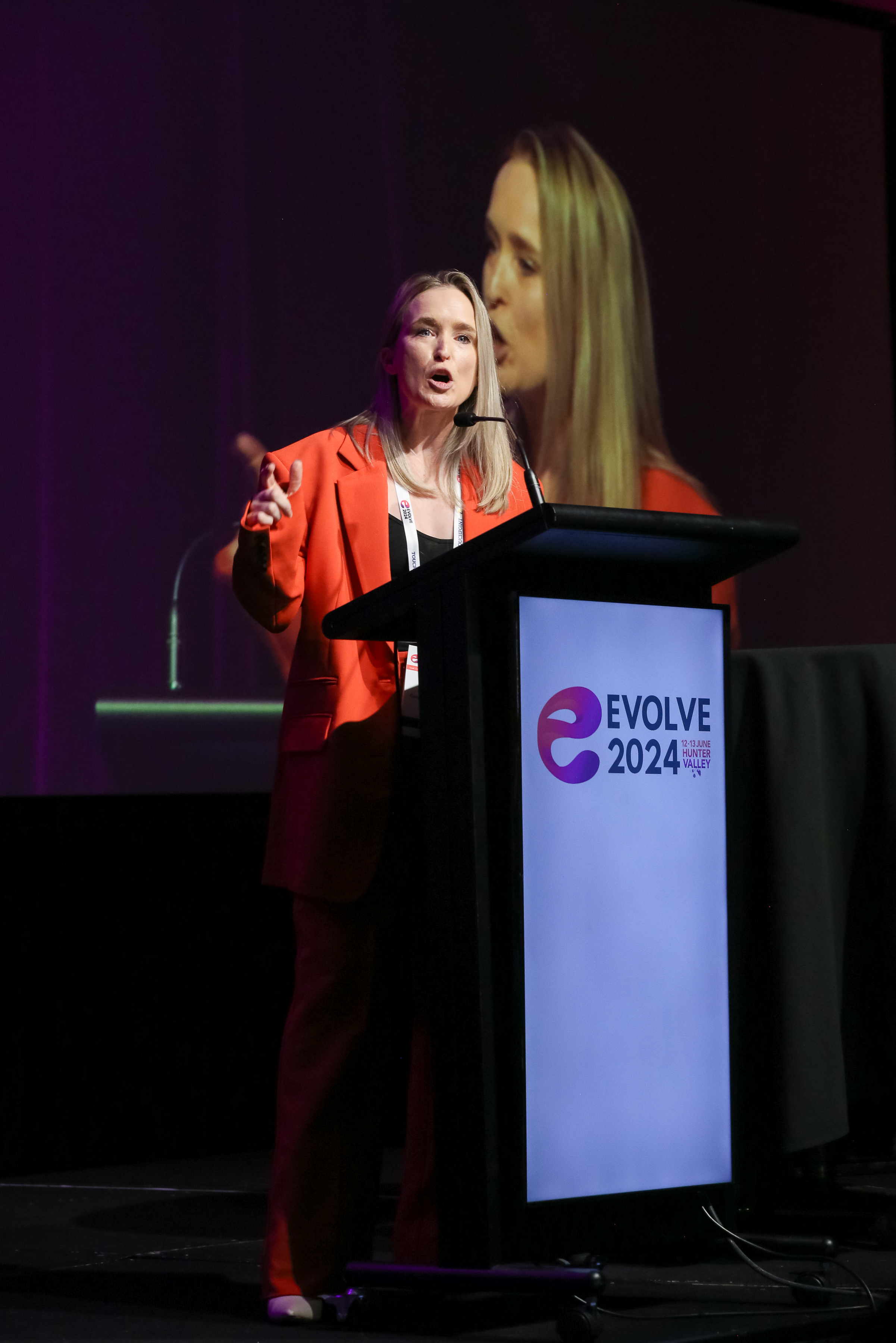 Libbie at the Evolve 2024 podium